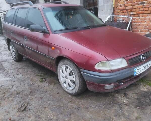 Красный Опель Астра, объемом двигателя 1.6 л и пробегом 320 тыс. км за 1200 $, фото 6 на Automoto.ua