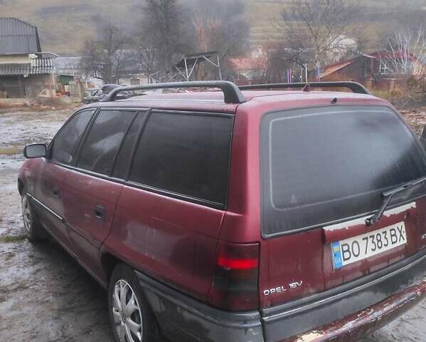 Красный Опель Астра, объемом двигателя 1.6 л и пробегом 320 тыс. км за 1200 $, фото 4 на Automoto.ua
