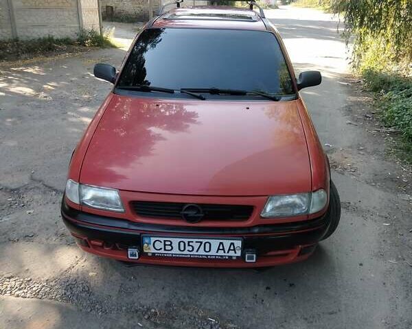 Красный Опель Астра, объемом двигателя 1.7 л и пробегом 260 тыс. км за 2650 $, фото 8 на Automoto.ua