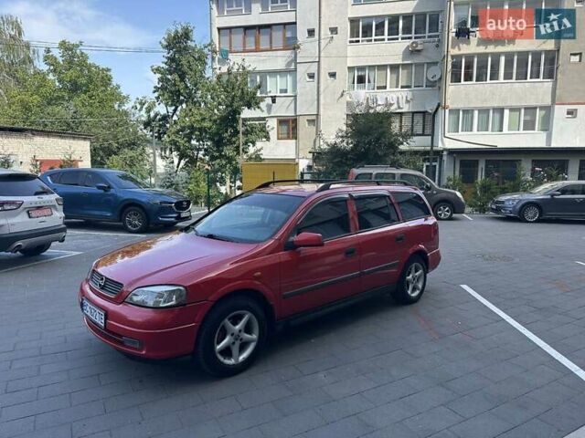 Красный Опель Астра, объемом двигателя 1.6 л и пробегом 250 тыс. км за 2550 $, фото 9 на Automoto.ua