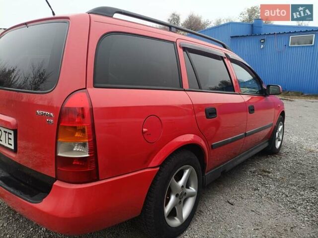 Червоний Опель Астра, об'ємом двигуна 1.6 л та пробігом 270 тис. км за 2800 $, фото 1 на Automoto.ua