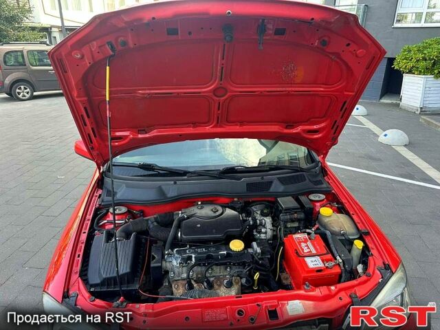 Красный Опель Астра, объемом двигателя 1.6 л и пробегом 300 тыс. км за 2550 $, фото 5 на Automoto.ua