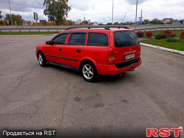 Красный Опель Астра, объемом двигателя 1.6 л и пробегом 300 тыс. км за 2550 $, фото 3 на Automoto.ua