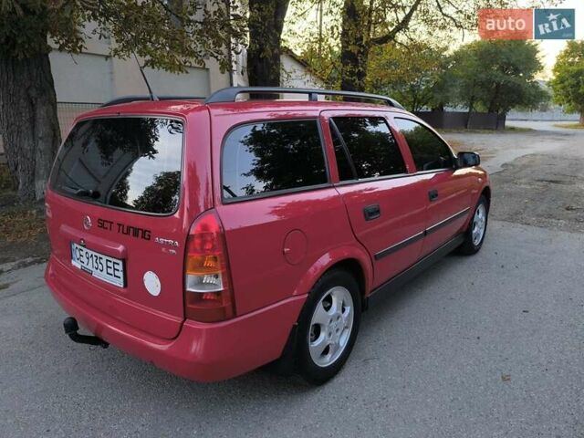 Красный Опель Астра, объемом двигателя 1.6 л и пробегом 310 тыс. км за 3200 $, фото 4 на Automoto.ua