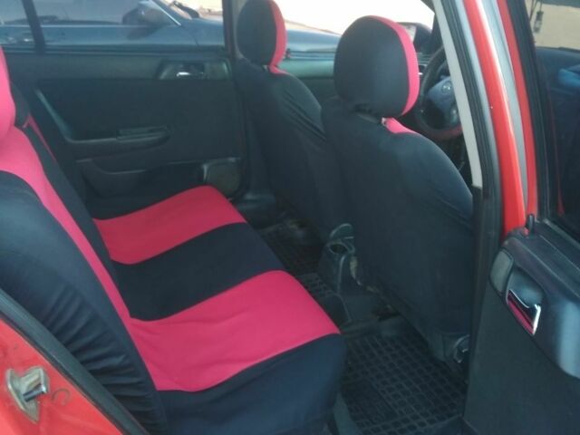 Червоний Опель Астра, об'ємом двигуна 1.6 л та пробігом 250 тис. км за 2600 $, фото 7 на Automoto.ua