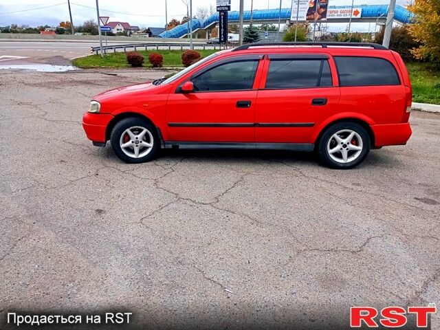 Красный Опель Астра, объемом двигателя 1.6 л и пробегом 300 тыс. км за 2550 $, фото 1 на Automoto.ua