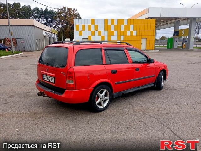 Красный Опель Астра, объемом двигателя 1.6 л и пробегом 300 тыс. км за 2550 $, фото 2 на Automoto.ua