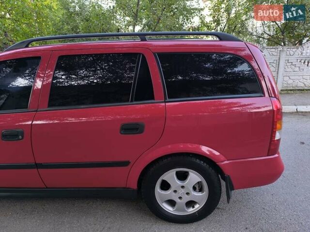 Красный Опель Астра, объемом двигателя 1.6 л и пробегом 310 тыс. км за 3200 $, фото 24 на Automoto.ua