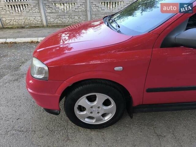 Красный Опель Астра, объемом двигателя 1.6 л и пробегом 310 тыс. км за 3200 $, фото 20 на Automoto.ua