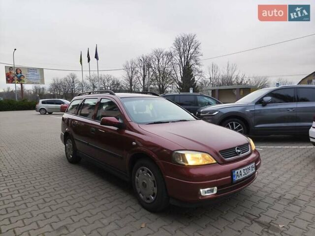 Красный Опель Астра, объемом двигателя 2 л и пробегом 281 тыс. км за 2999 $, фото 28 на Automoto.ua