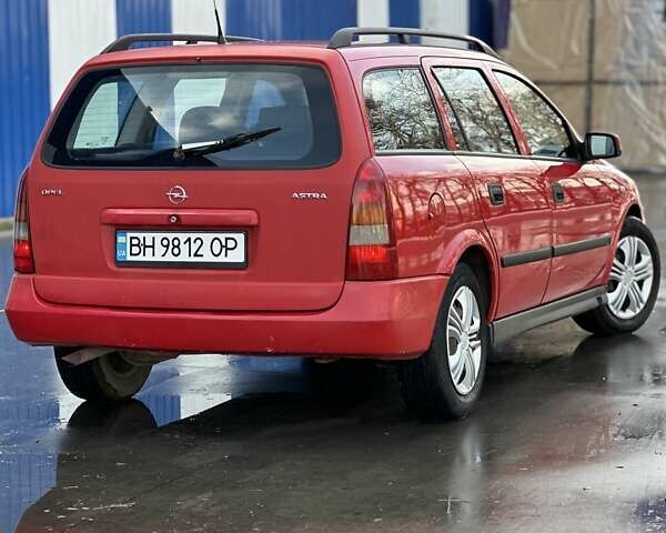 Красный Опель Астра, объемом двигателя 2 л и пробегом 250 тыс. км за 2699 $, фото 3 на Automoto.ua
