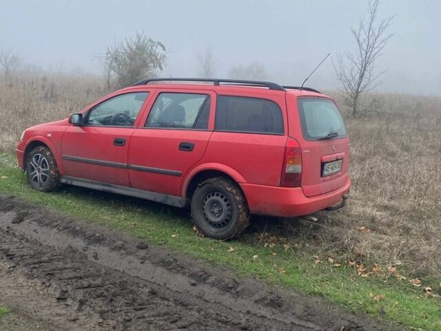 Красный Опель Астра, объемом двигателя 1.6 л и пробегом 234 тыс. км за 2500 $, фото 2 на Automoto.ua