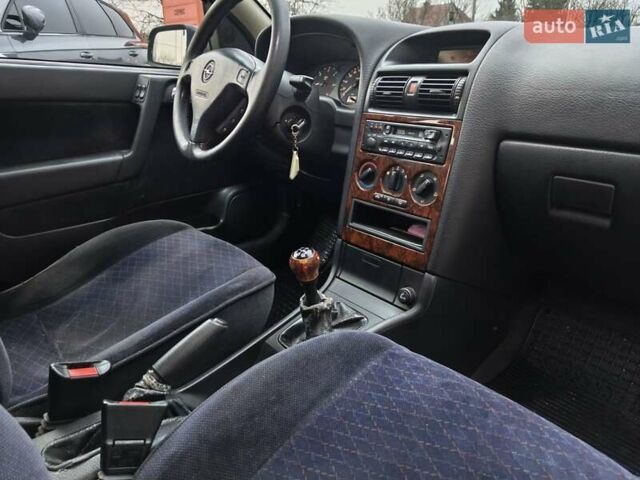 Красный Опель Астра, объемом двигателя 2 л и пробегом 281 тыс. км за 2999 $, фото 18 на Automoto.ua