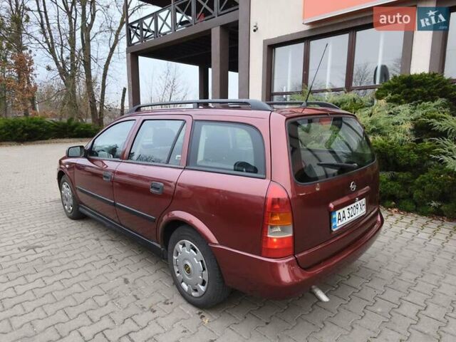 Красный Опель Астра, объемом двигателя 2 л и пробегом 281 тыс. км за 2999 $, фото 25 на Automoto.ua