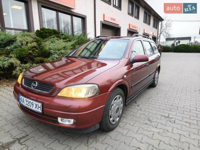 Красный Опель Астра, объемом двигателя 2 л и пробегом 281 тыс. км за 2999 $, фото 29 на Automoto.ua