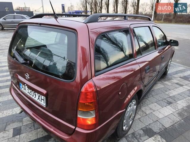 Красный Опель Астра, объемом двигателя 2 л и пробегом 281 тыс. км за 2999 $, фото 8 на Automoto.ua