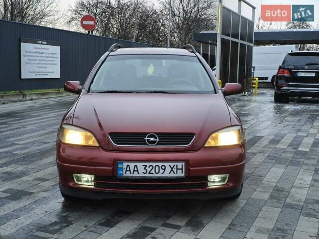 Красный Опель Астра, объемом двигателя 2 л и пробегом 281 тыс. км за 2999 $, фото 1 на Automoto.ua