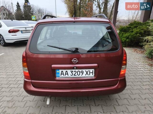 Красный Опель Астра, объемом двигателя 2 л и пробегом 281 тыс. км за 2999 $, фото 23 на Automoto.ua