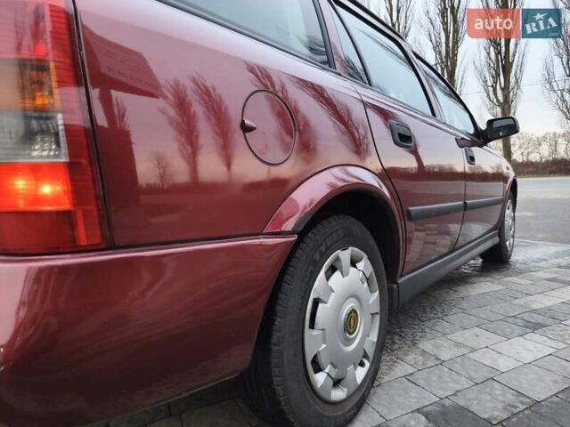 Красный Опель Астра, объемом двигателя 2 л и пробегом 281 тыс. км за 2999 $, фото 9 на Automoto.ua