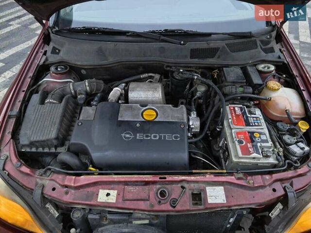 Красный Опель Астра, объемом двигателя 2 л и пробегом 281 тыс. км за 2999 $, фото 6 на Automoto.ua