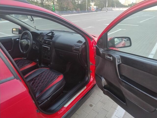 Красный Опель Астра, объемом двигателя 2 л и пробегом 10 тыс. км за 2500 $, фото 5 на Automoto.ua