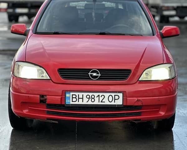 Красный Опель Астра, объемом двигателя 2 л и пробегом 250 тыс. км за 2699 $, фото 6 на Automoto.ua