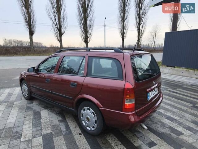 Красный Опель Астра, объемом двигателя 2 л и пробегом 281 тыс. км за 2999 $, фото 11 на Automoto.ua