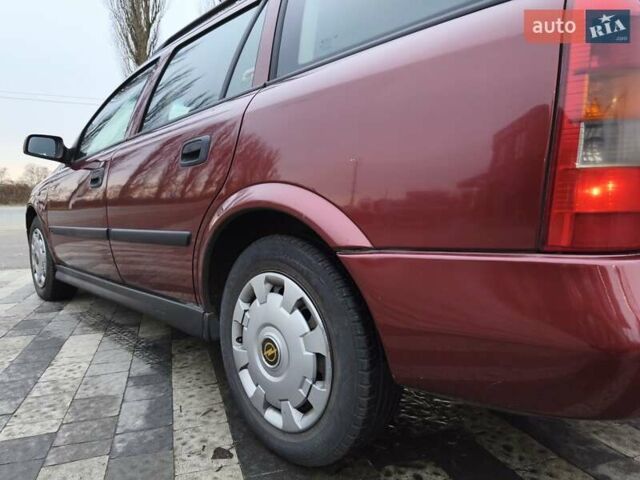 Красный Опель Астра, объемом двигателя 2 л и пробегом 281 тыс. км за 2999 $, фото 10 на Automoto.ua