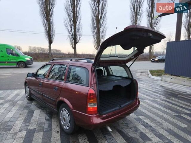 Красный Опель Астра, объемом двигателя 2 л и пробегом 281 тыс. км за 2999 $, фото 5 на Automoto.ua