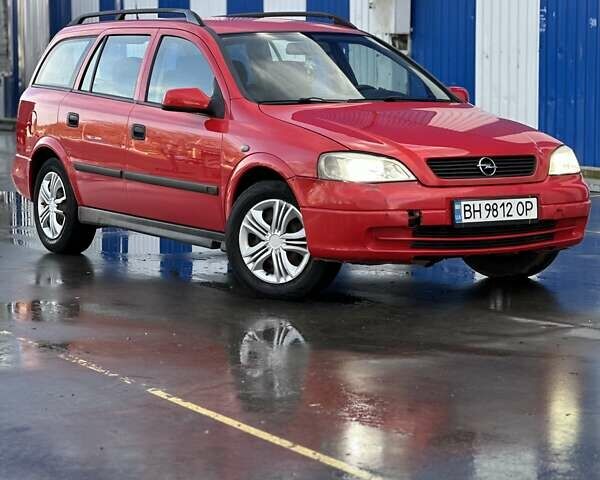 Красный Опель Астра, объемом двигателя 2 л и пробегом 250 тыс. км за 2699 $, фото 1 на Automoto.ua