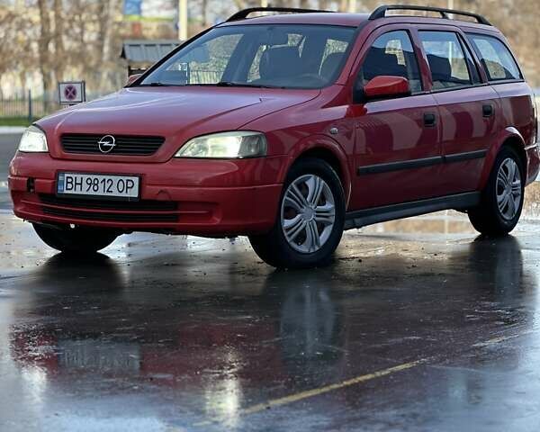 Красный Опель Астра, объемом двигателя 2 л и пробегом 250 тыс. км за 2699 $, фото 2 на Automoto.ua