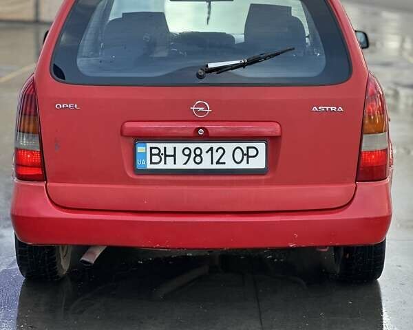 Красный Опель Астра, объемом двигателя 2 л и пробегом 250 тыс. км за 2699 $, фото 5 на Automoto.ua