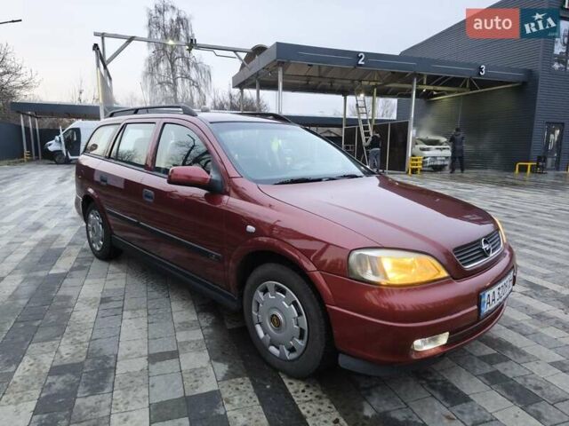 Красный Опель Астра, объемом двигателя 2 л и пробегом 281 тыс. км за 2999 $, фото 13 на Automoto.ua