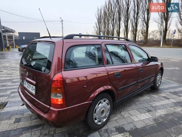 Красный Опель Астра, объемом двигателя 2 л и пробегом 281 тыс. км за 2999 $, фото 12 на Automoto.ua