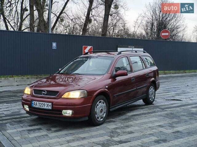 Красный Опель Астра, объемом двигателя 2 л и пробегом 281 тыс. км за 2999 $, фото 2 на Automoto.ua