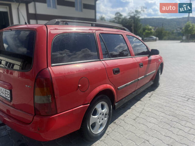 Красный Опель Астра, объемом двигателя 2 л и пробегом 300 тыс. км за 2700 $, фото 7 на Automoto.ua
