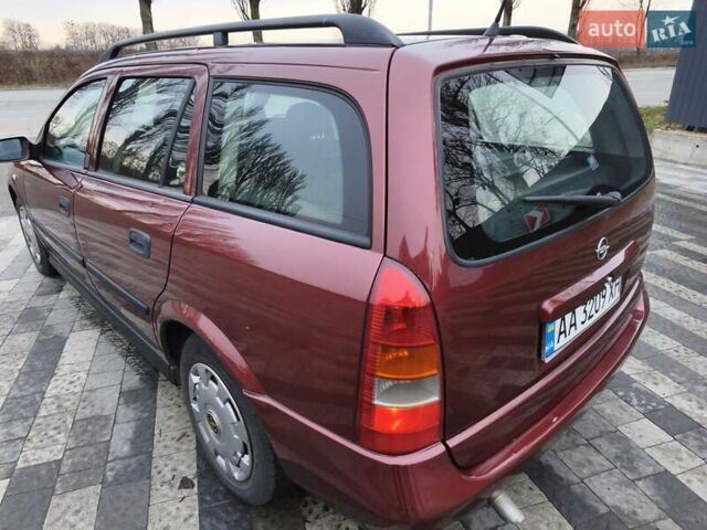 Красный Опель Астра, объемом двигателя 2 л и пробегом 281 тыс. км за 2999 $, фото 7 на Automoto.ua