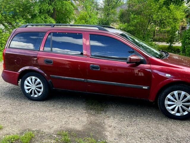 Червоний Опель Астра, об'ємом двигуна 1.6 л та пробігом 230 тис. км за 2100 $, фото 2 на Automoto.ua