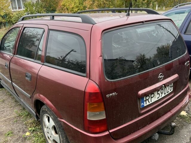 Красный Опель Астра, объемом двигателя 2 л и пробегом 200 тыс. км за 650 $, фото 3 на Automoto.ua