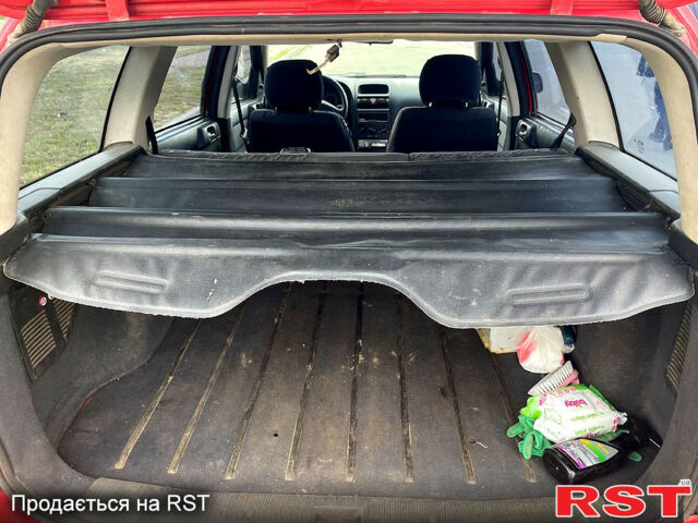 Красный Опель Астра, объемом двигателя 1.4 л и пробегом 311 тыс. км за 2450 $, фото 2 на Automoto.ua