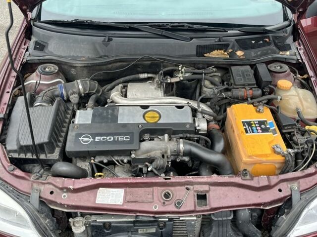 Червоний Опель Астра, об'ємом двигуна 2 л та пробігом 450 тис. км за 2700 $, фото 7 на Automoto.ua