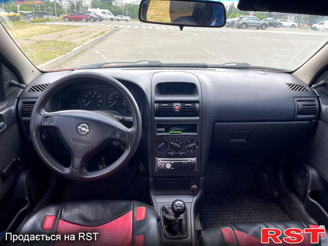 Красный Опель Астра, объемом двигателя 1.4 л и пробегом 311 тыс. км за 2450 $, фото 1 на Automoto.ua