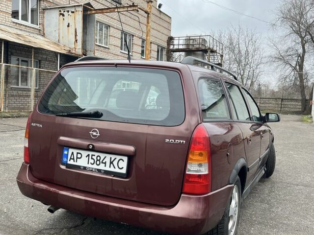Червоний Опель Астра, об'ємом двигуна 2 л та пробігом 450 тис. км за 2700 $, фото 2 на Automoto.ua