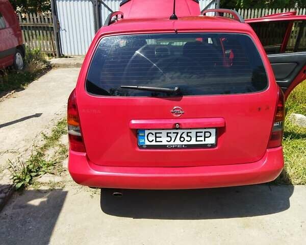 Красный Опель Астра, объемом двигателя 1.6 л и пробегом 398 тыс. км за 3500 $, фото 29 на Automoto.ua