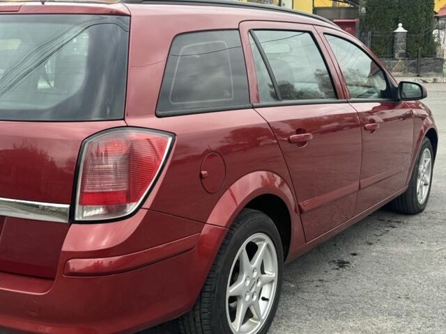 Красный Опель Астра, объемом двигателя 1.9 л и пробегом 347 тыс. км за 4000 $, фото 12 на Automoto.ua