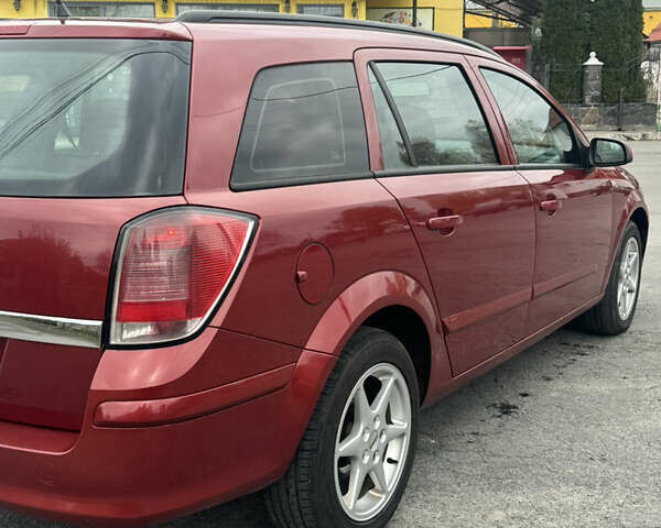 Красный Опель Астра, объемом двигателя 1.9 л и пробегом 348 тыс. км за 4000 $, фото 12 на Automoto.ua
