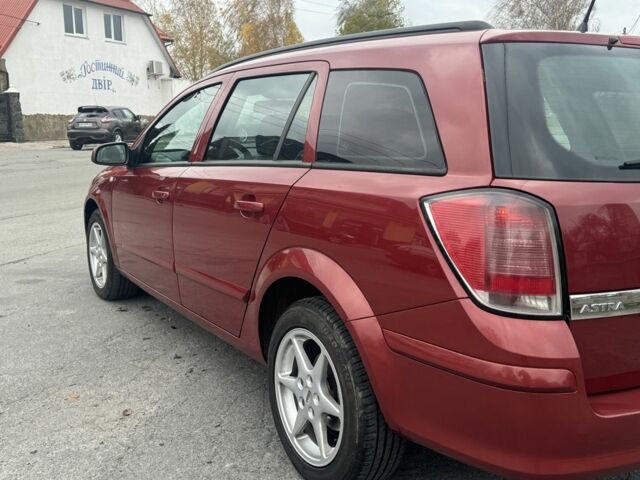 Красный Опель Астра, объемом двигателя 1.9 л и пробегом 347 тыс. км за 4000 $, фото 6 на Automoto.ua