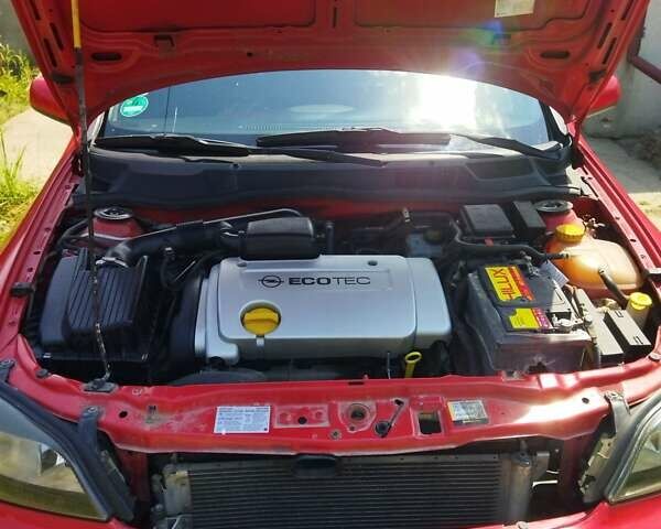 Красный Опель Астра, объемом двигателя 1.6 л и пробегом 398 тыс. км за 3500 $, фото 22 на Automoto.ua