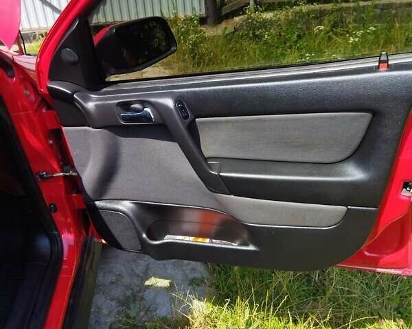 Красный Опель Астра, объемом двигателя 1.6 л и пробегом 398 тыс. км за 3500 $, фото 28 на Automoto.ua