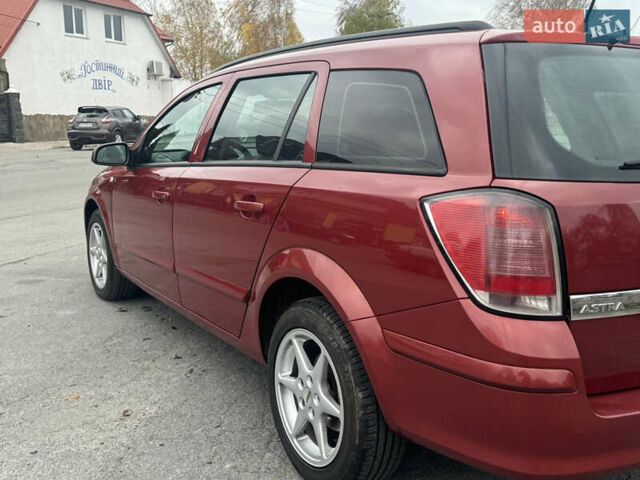 Красный Опель Астра, объемом двигателя 1.9 л и пробегом 348 тыс. км за 4000 $, фото 6 на Automoto.ua